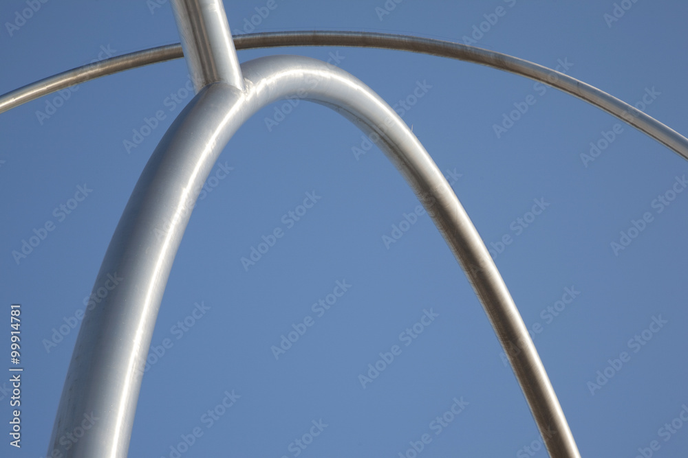 Abstract Metal Bars against Blue Sky Background Abstract Metal Bars against Blue Sky Background
