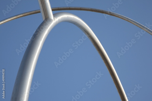 Abstract Metal Bars against Blue Sky Background