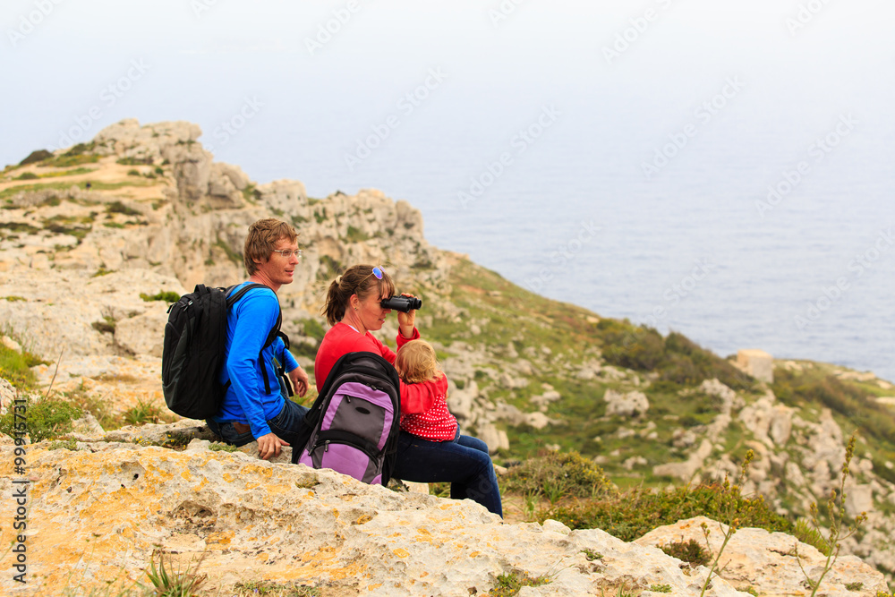 Fototapeta premium family with little child travel in scenic mountains