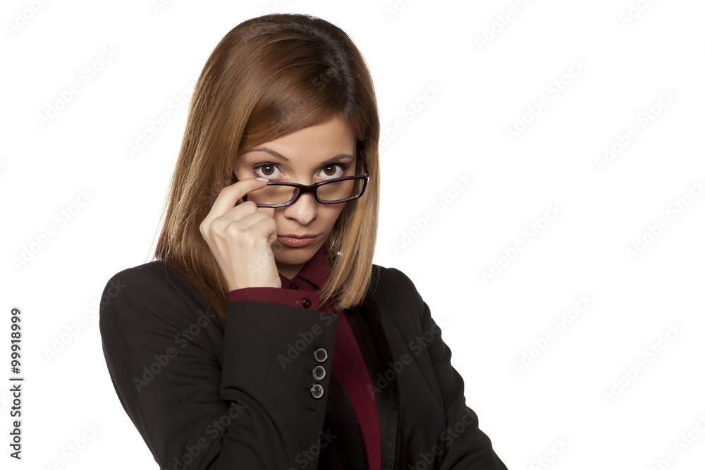 worried business woman looking with distrust worried business woman looking with distrust