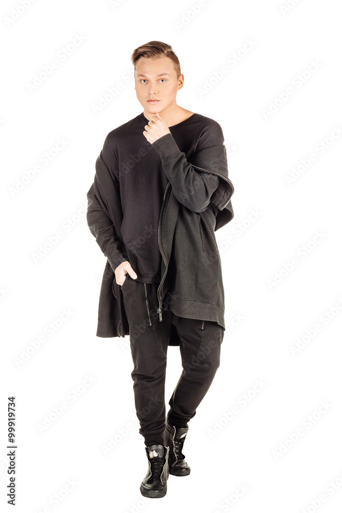 Full length portrait of a happy male fashion man  against wall i