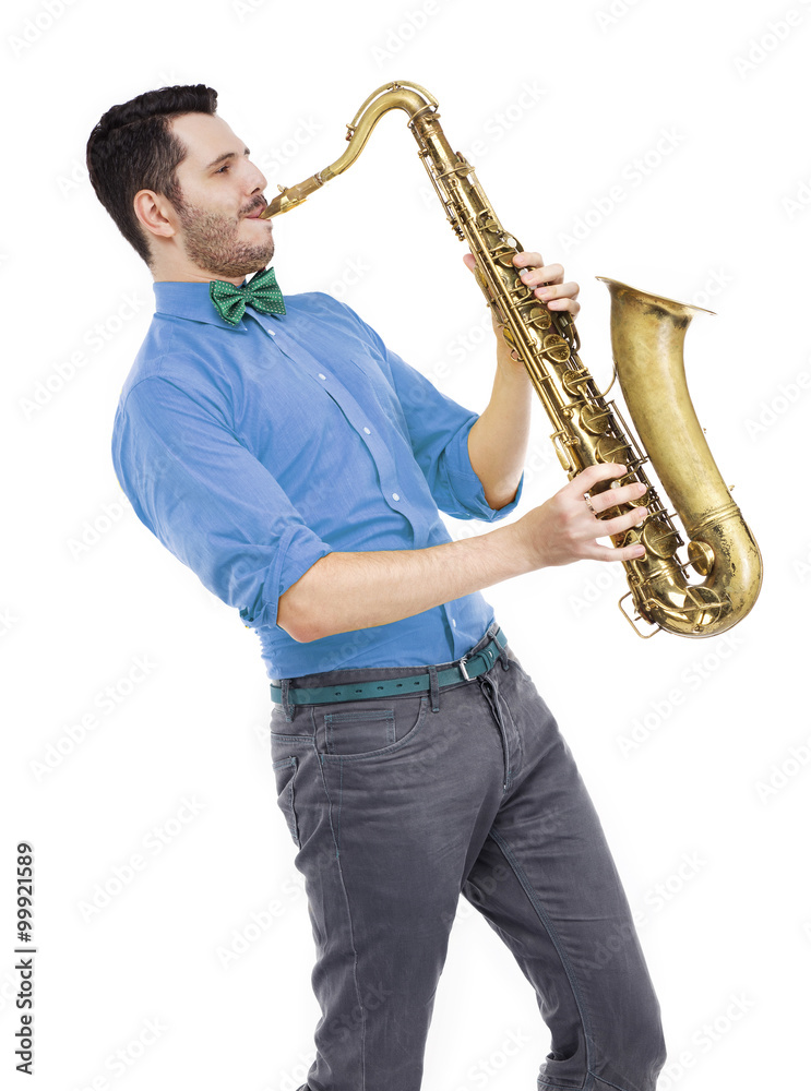 Fototapeta premium man saxophonist playing saxophone player in studio isolated on w