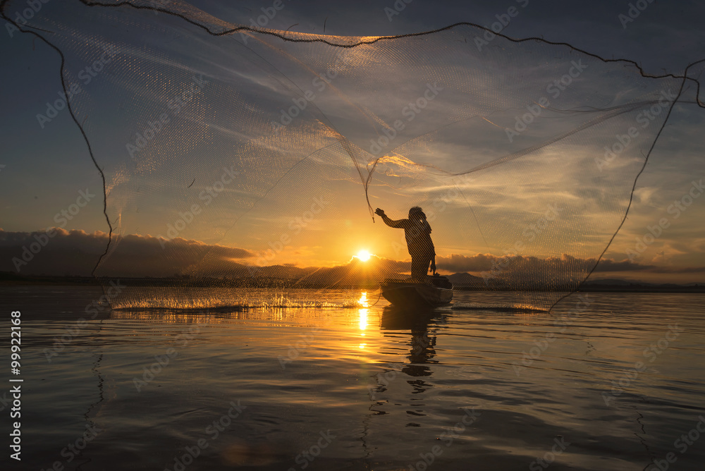 ..Fisherman of Bangpra Lake in action when fishing, Thailand.