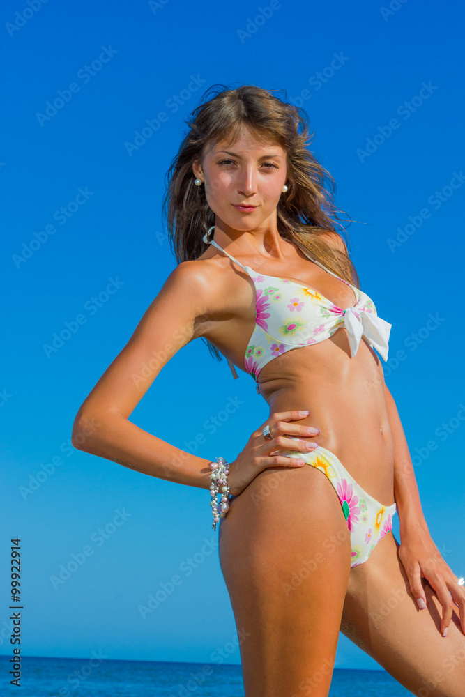 Pretty girl in bikini at the beach Pretty girl in bikini at the beach