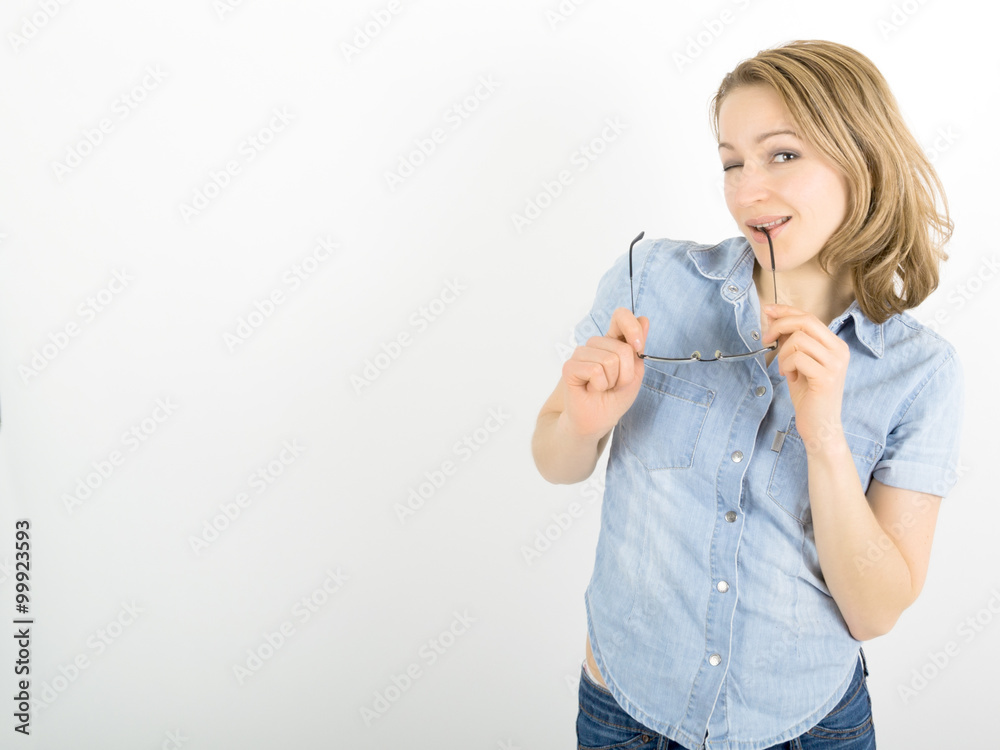 beautiful young woman has many different emotions from happiness, sadness to anger and stress. She is wearing a denim shirt and glasses beautiful young woman has many different emotions from happiness, sadness to anger and stress. She is wearing a denim shirt and glasses