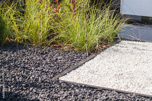 gray gravel with grass in the design decision