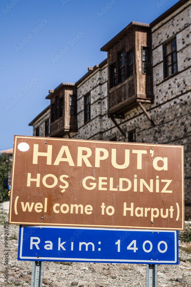 Obraz premium Harput City Sign Before Traditional Ottoman Houses