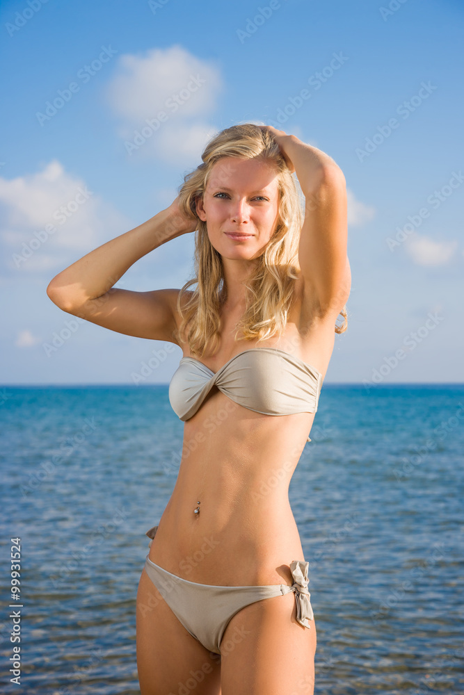 Blonde woman on the beach