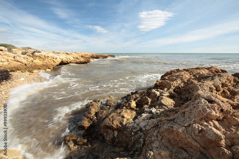 rock beach in Santa Pola, Alicante, Spain
