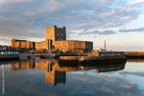 Carrickfergus Castle at sunset. One of the best preserved medieval structures in Northern Ireland photo