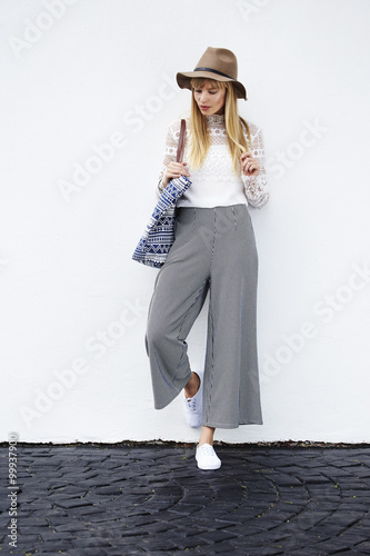 Posing young model in culottes and lace top photo