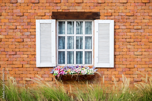 Window in a red brick wall