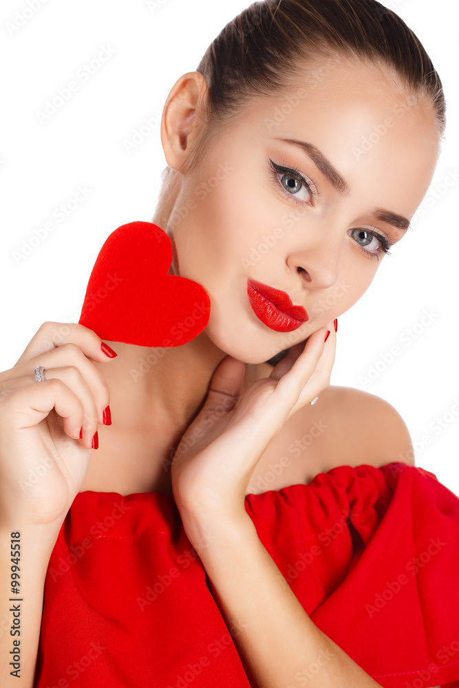 Portrait of beautiful girl with red heart in hand Portrait of beautiful girl with red heart in hand