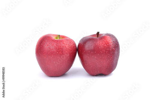 Red ripe apples on white background.