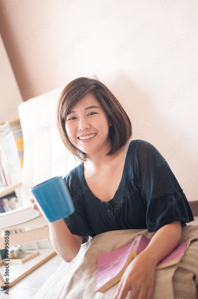 Woman reading book and sipping fresh coffee Woman reading book and sipping fresh coffee
