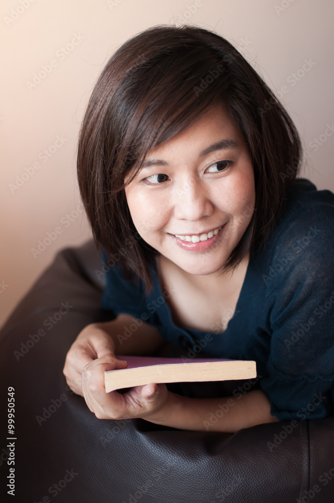 Woman holding a book. Woman holding a book.
