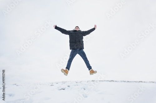 happy smiling active man jumping