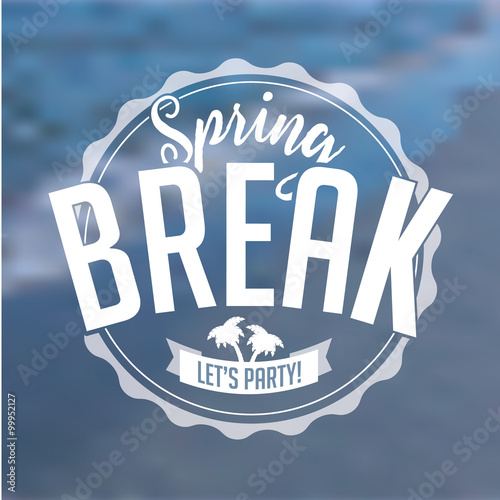 Spring Break stamp on defocused beach background.