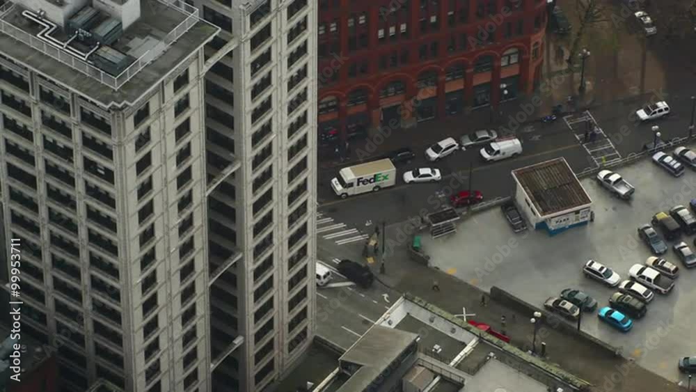 Fast motion of traffic and people walking as viewed from above the city. Fast motion of traffic and people walking as viewed from above the city.