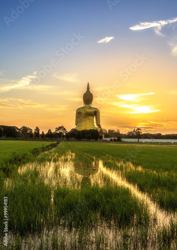 The Biggest Buddha Image In Thailand Under Sunrise