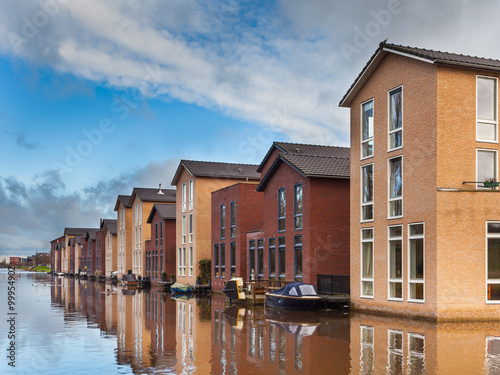 Modern Houses on the Water Front in a row