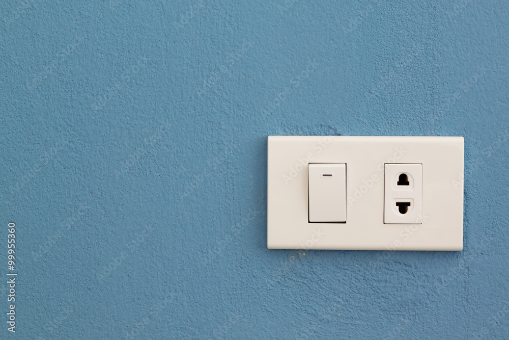 Electricity switch and plug on concrete wall Electricity switch and plug on concrete wall