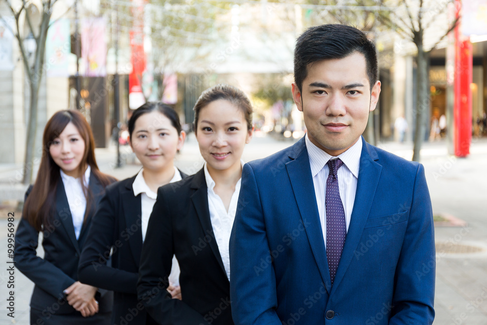 Group of business people standing at outdoor Group of business people standing at outdoor
