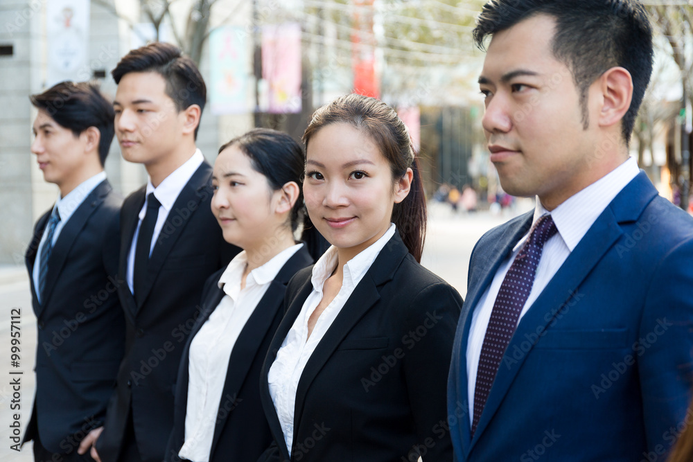 Group of business people standing at outdoor Group of business people standing at outdoor