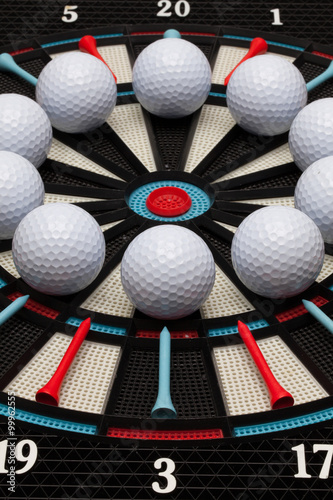 Detail dartboard with golf balls