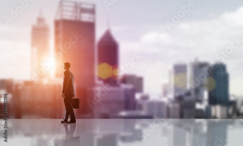 Businessman facing new day