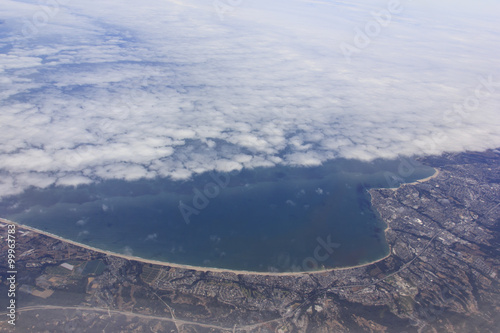 Aerial view of the California coast with clouds