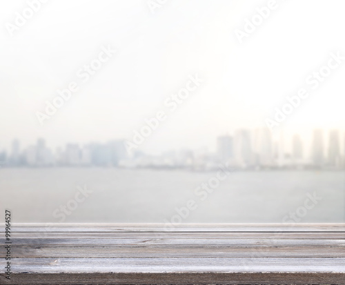 Table Top And Blur Building Of Background