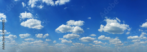 Photography White heap clouds in the blue sky at summer day.