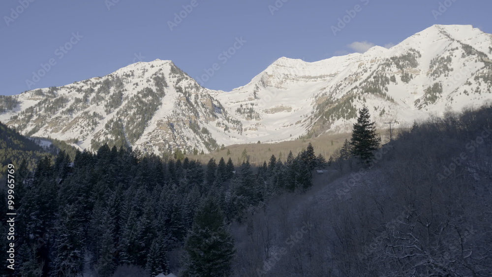 Time-lapse sunrise over snow capped Utah mountains. Time-lapse sunrise over snow capped Utah mountains.