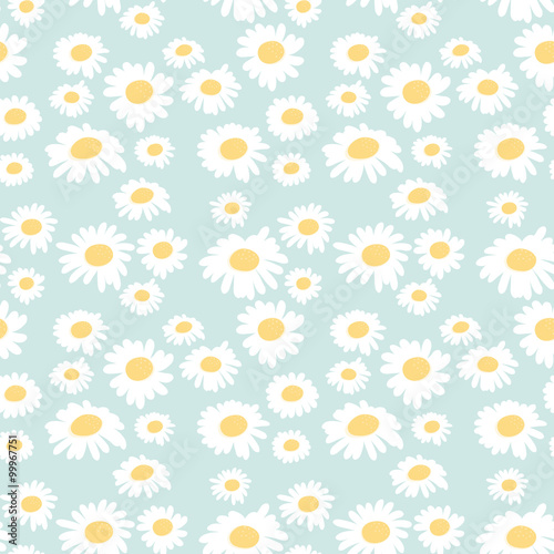 Seamless floral pattern with chamomiles on blue background