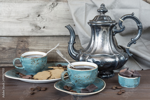 Two cups of black coffee