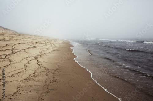 Moody, misty beach on Cape Cod at Wellfleet, Massachusetts.