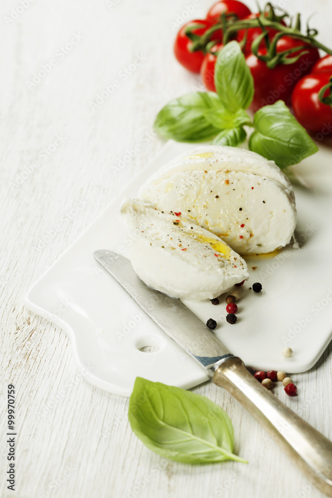 mozzarella, organic cherry tomatoes and fresh basil