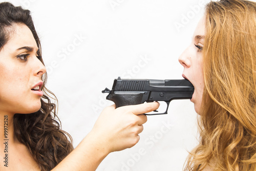 Portrait of two beautiful women, one opposite the other, in whic photo