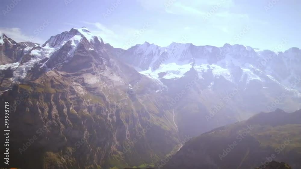 Panning shot of the majestic Swiss alps Panning shot of the majestic Swiss alps