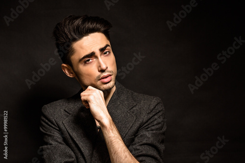 Model man isolated on black background