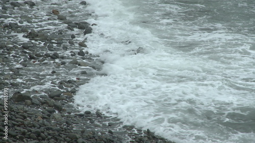 Rocky beach at the Portland Head Light in Maine. photo