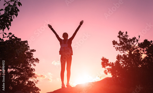 Silhouette of a happy young...