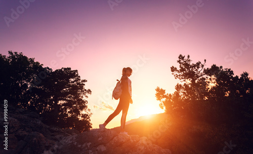 Silhouette of a happy young...