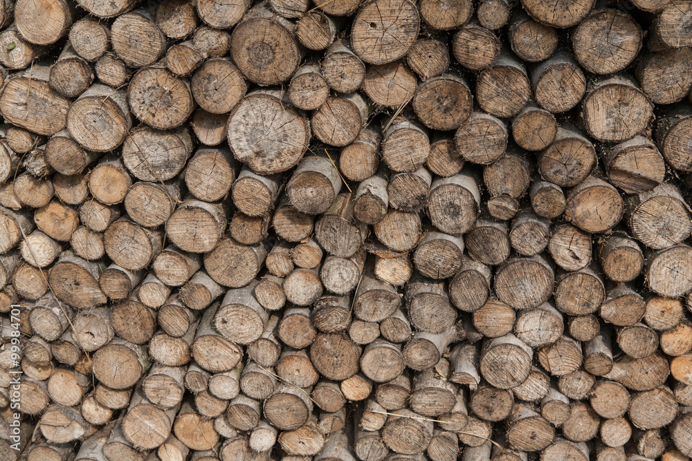 Many wood firewood woodpile. Stack of firewood Many wood firewood woodpile. Stack of firewood