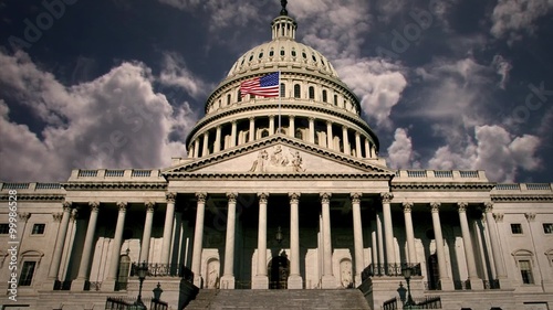 Capitol Building in Washington DC with Clouds Time lapse and Waving USA Flag.