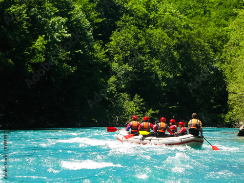 rafting boat on the fast mountain river