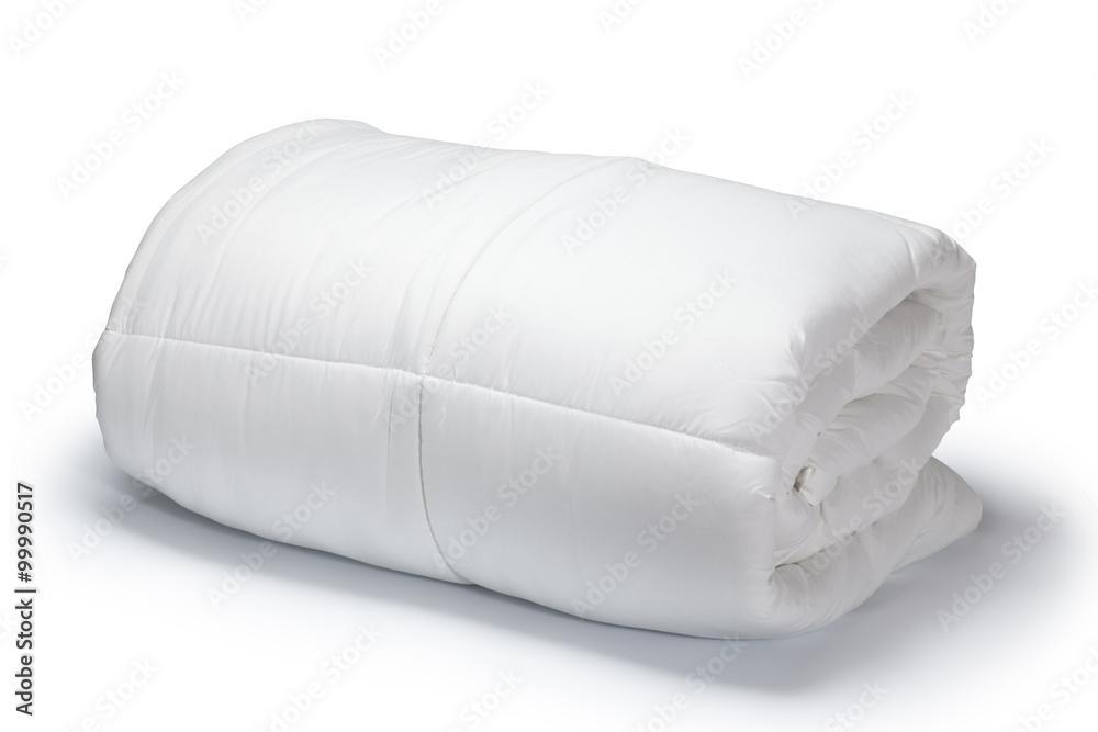 Φωτογραφία Warm and confortable folded white quilt on white background