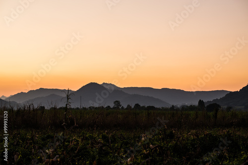 Light of sunries with mountains background in thailand