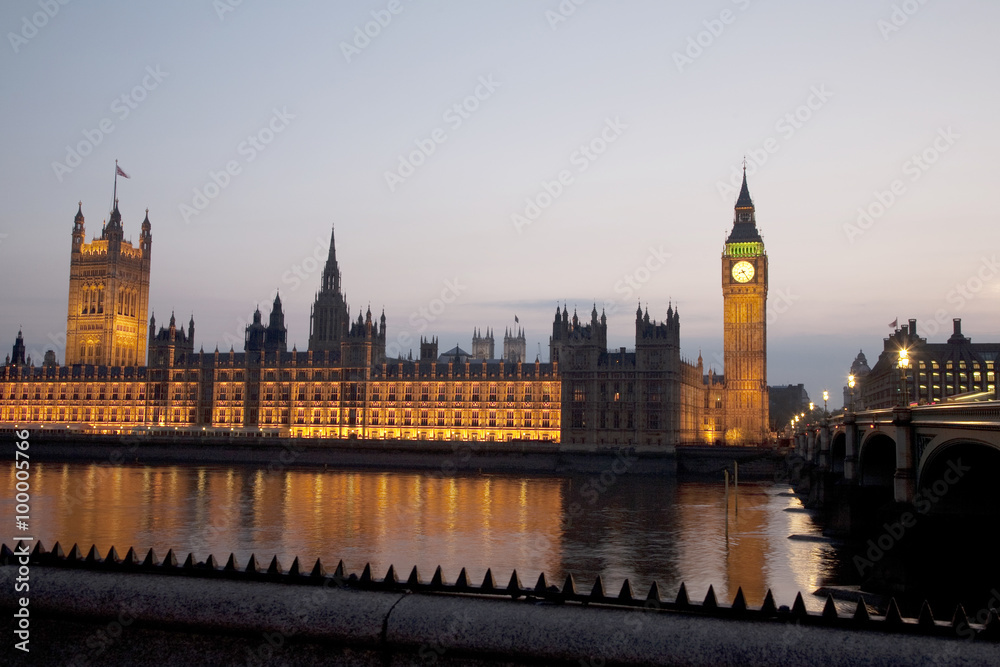Houses of Parliament and Big Ben illuminated at night in London, England, UK